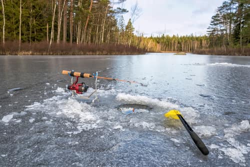 Ice fishing with minnows during winter