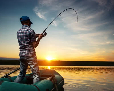 Sunset fishing in a rubber dinghy