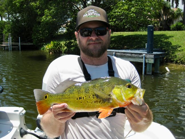 Adam with Peacock Bass from south florida