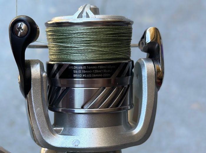 Spinning reel showing the size and amount of line this reel is rated for